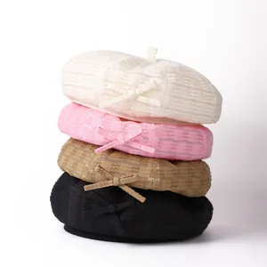 Stack of four Japanese-style textured beret hats in white, pink, tan, and black