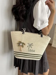 Exquisite gewebte Stroh-Schultertasche mit feiner Palmenstickerei und GOA-Anhänger