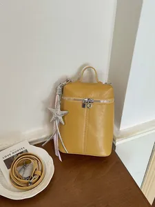 Borsa a tracolla gialla minimalista per cellulare con ciondolo a stella scintillante