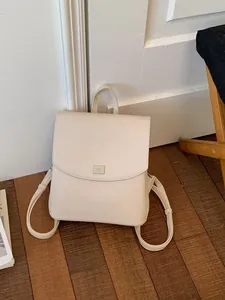 Stylish minimalist cream white women's backpack for summer 2026 commuting and leisure