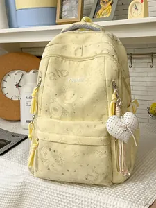 High-capacity pale yellow backpack with heart patterns for students and daily commuting