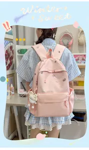 Sweet pink school backpack with cute cartoon patterns for teenage girls