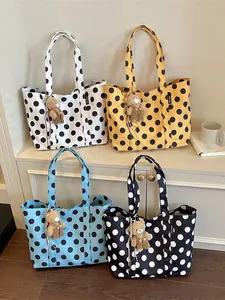 Stylish polka dot large capacity tote bags in four colors with cute bear charms.