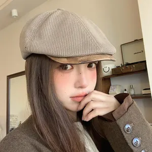 Vintage knit newsboy cap for women in warm beige with textured brim and retro aesthetic