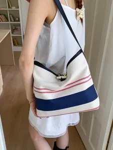 Large capacity striped canvas tote bag for women featuring a casual summer style design
