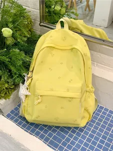 Fresh yellow floral student backpack with a star charm and large capacity for summer travel