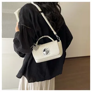 Trendy white textured small square handbag with silver bead handle and heart-shaped charm