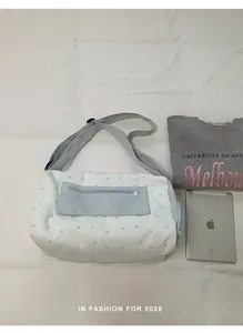 Detailed view of grey and white star patterned sports gym bag featuring dry wet separation design
