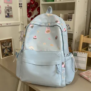 Light blue school backpack with cute bear patterns and sweet English text details