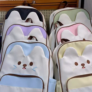 Cute cat-themed backpacks in multiple pastel colors with ears for girls and students