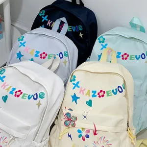 Fashionable colorful backpacks collection in pastel shades with artistic graffiti prints