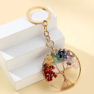 Elegant Tree of Life keychain featuring vibrant colorful crushed stones on gold-tone metal