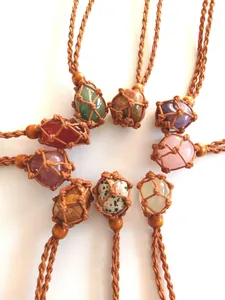 Multiple polished natural crystal stone pendants in handmade woven mesh necklaces