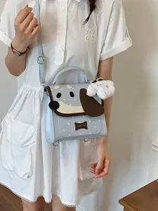 Cute light blue puppy design backpack with star patterns and charm for school style