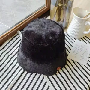 Warm winter black faux fur bucket hat with thick plush material for women outdoors