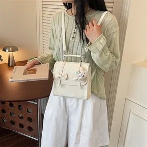 Zainetto donna stile college bianco panna con fiocco e simpatico ciondolo a coniglietto
