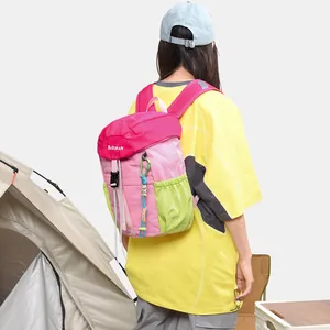 Back view of a person wearing a pink and green casual large capacity backpack