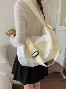 Minimalist white and yellow dry-wet separation gym bag for sports and short travel trips.