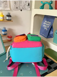 Close-up view of a vibrant multi-color color-block nylon backpack for stylish students