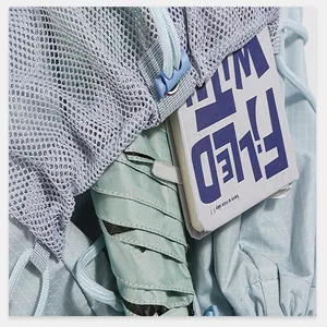 Close-up of durable mesh and water-resistant fabric on a stylish women's backpack
