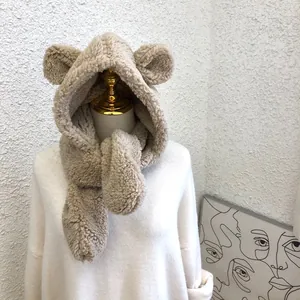 Close-up detail of cozy beige plush bear ear hooded scarf set for winter warmth and style