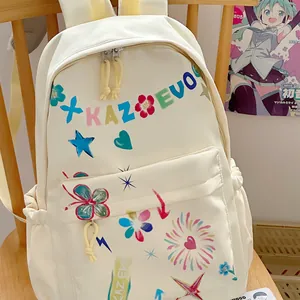 Close-up detail of a white stylish canvas backpack with KAZEVO colorful graffiti patterns