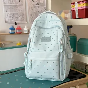 Japanse lichtblauwe schoolrugzak met schattige strikjes en kleine hartjespatronen