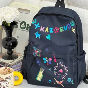Detailed view of black backpack with vibrant colorful graffiti patterns and flowers