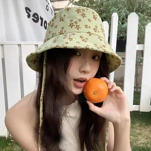 Chapeau bob à fleurs pour femme avec cordons de protection solaire en coloris vert clair
