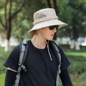 Side view of men's beige boonie hat featuring breathable mesh vents and chin strap