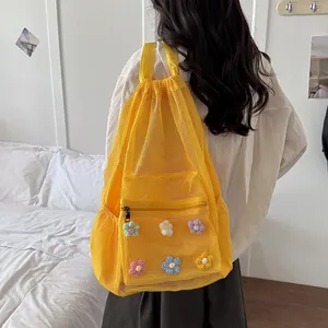 Large capacity yellow mesh drawstring backpack with colorful crochet flowers for summer