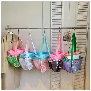 Detailed view of colorful large capacity mesh tote bags with matching pouches for women