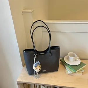Stylish large-capacity casual tote bag for women with cute teddy bear charm detail