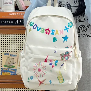 Close-up of a trendy white girl's backpack featuring vibrant colorful hand-drawn graphic patterns