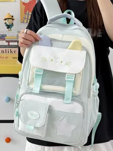 Mochila escolar color verde menta con diseño de gato y varios compartimentos niñas