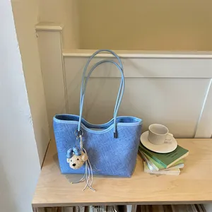 Casual blue denim texture large capacity tote bag featuring a cute bear plush charm