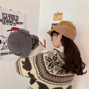 Stylish Japanese style fleece earflap hat for women worn in a cozy lifestyle setting.