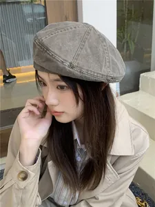 Vintage grey washed denim beret for women, stylish painter hat lifestyle close-up view
