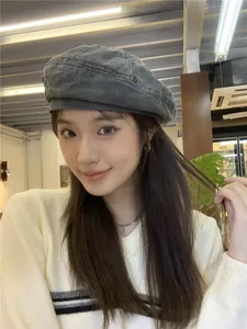Asian model wearing a retro charcoal gray washed denim beret for a stylish and chic look