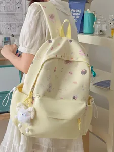 Cute sweet cream yellow backpack with animal patterns and plush charm for girls