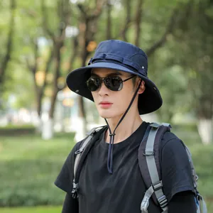 Navy blue men's wide brim outdoor bucket hat with adjustable chin strap for sun protection