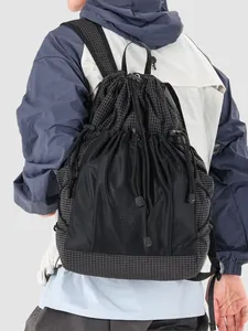 Black checkered drawstring backpack with mesh pocket for stylish outdoor use