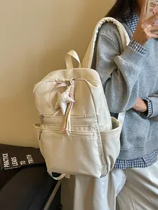 Mochila minimalista de lona beige para mujer de estilo coreano con dije de estrella
