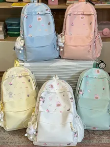 Cute pastel colored school backpacks for girls with animal patterns and plush charms