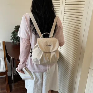 Sac à dos crème élégant avec fermeture à cordon pour les sorties quotidiennes de voyage