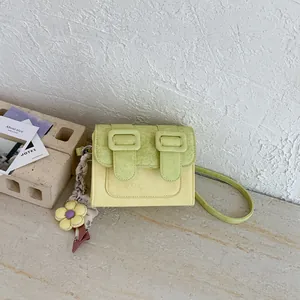 Elegant lime green color-block small square crossbody bag with a decorative flower charm