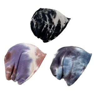 Set of three vibrant tie-dye slouchy beanies for men and women in various artistic colors