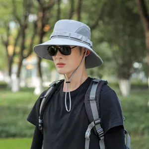 Side view of grey outdoor sun hat for men featuring breathable mesh and chin strap.