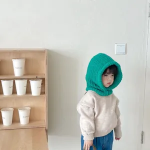 Vibrant green knitted children's balaclava hood featuring an integrated warm neck scarf