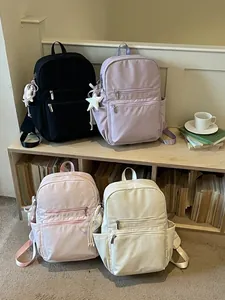Mochila ligera de lona estilo coreano para mujer disponible en cuatro colores